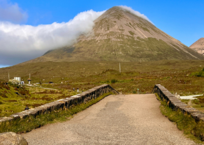 Sligachan Old Bridge on the Isle of Skye with mountain and clouds